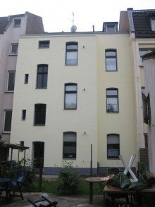 Hintere Fassade 4-Parteien Mehrfamilienhaus mit Garten in Duisburg-Beeck